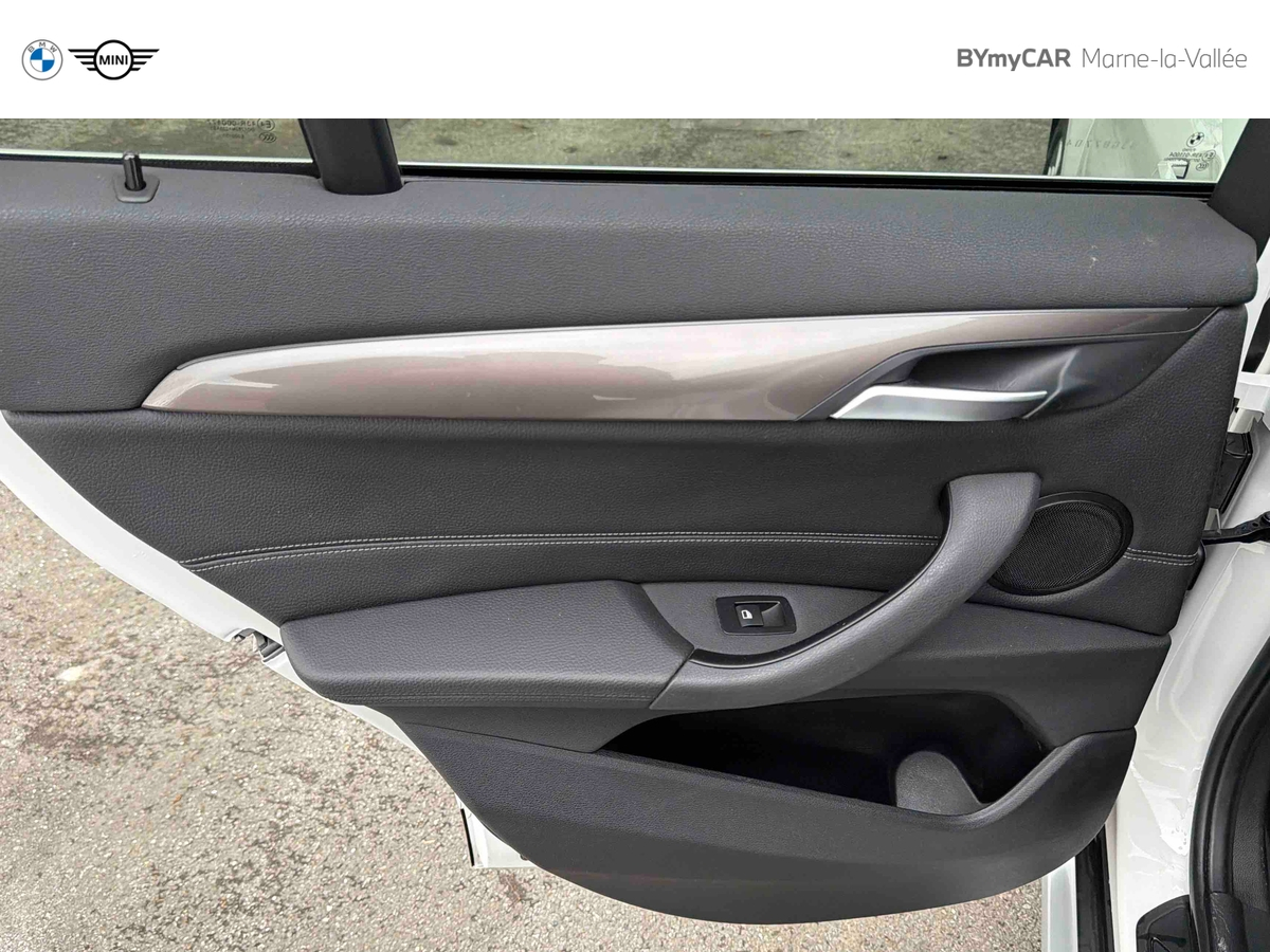 BMW X1 sDrive 18i 140 ch DKG7 — photo 26