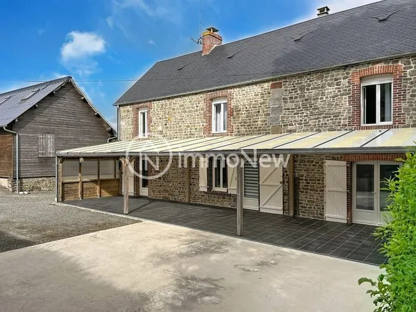 Maison et bâtiments / MONTABOT/ Près d'un hectare et pljus..