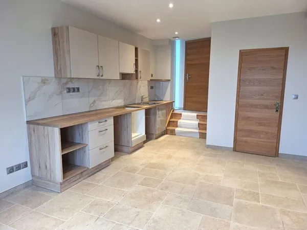 Appartement neuf F3 avec terrasse et jardinet - 790 HC