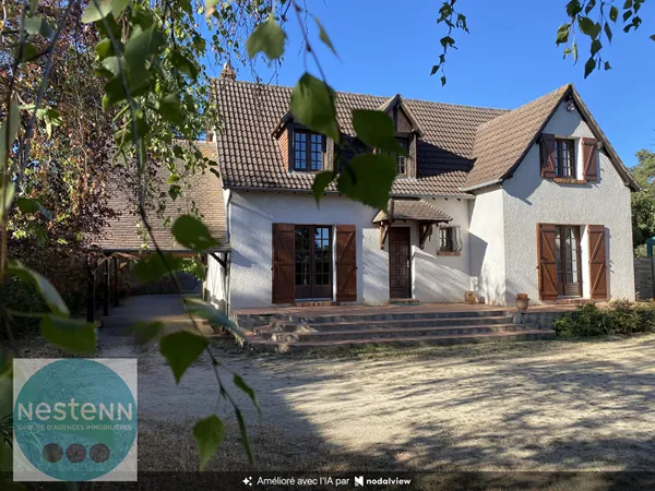 Une maison familiale aux beaux volumes, avec jardin, garage et sous-sol total à Olivet