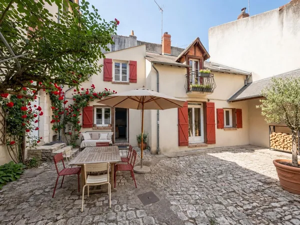 Duplex avec l'esprit et le confort d'une maison