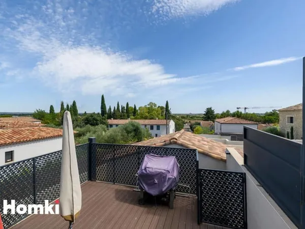 DPE C Appartement récent 3 pièces de 59 m² avec terrasse et parking à Gallargues-le-Montueux