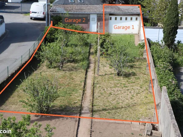 Terrain constructible incluant un garage