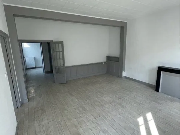 Appartement F3 centre-ville avec jardin en commun
