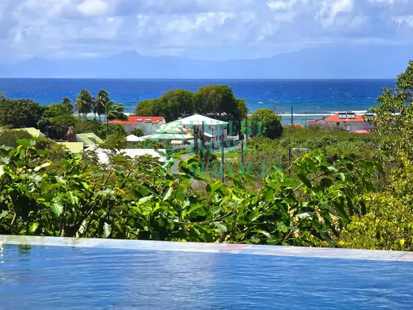 SUPERBE VILLA NEUVE AVEC PISCINE ET VUE MER