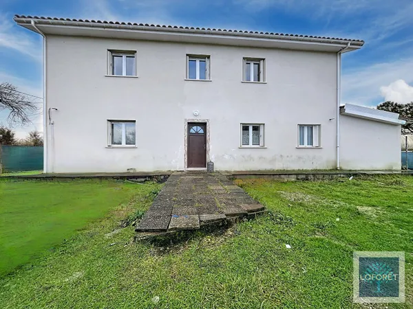 Maison six chambres et terrain arboré