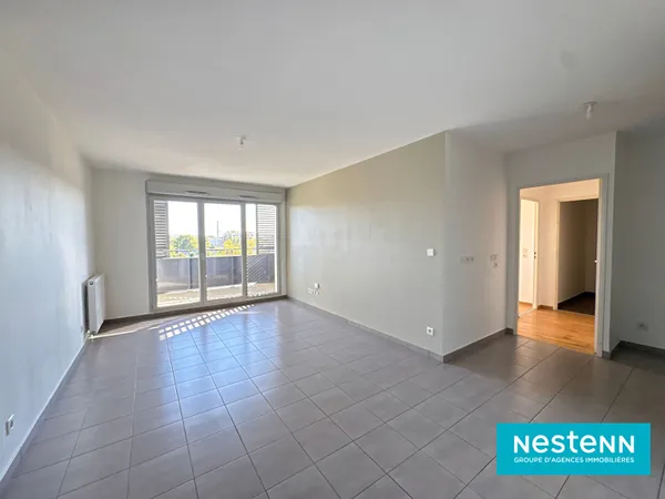 Appartement de type 3 de 54m² avec balcon et garage en sous-sol situé sur le secteur de Villeurbanne