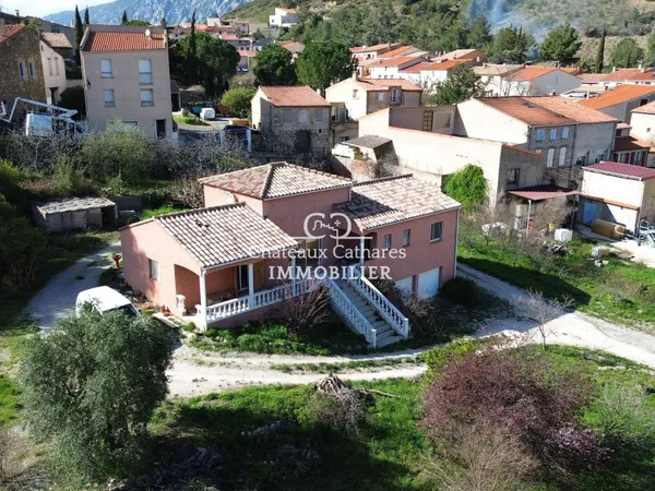 Maison 4 faces avec parcelle de 2400 m² environ