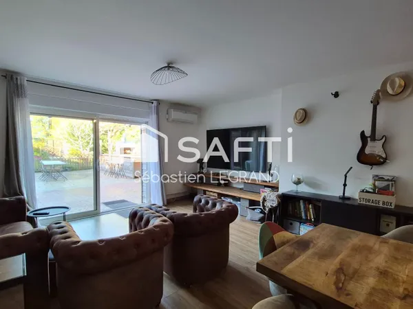 Appartement 3 chambres avec jardin, cave et parkings