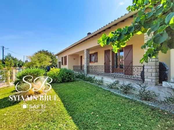 Maison familiale de plain-pied, garage et environnement calme