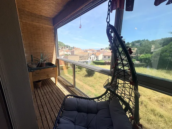 Appartement T3 de 82 m² avec balcon, parking privatif, cave et