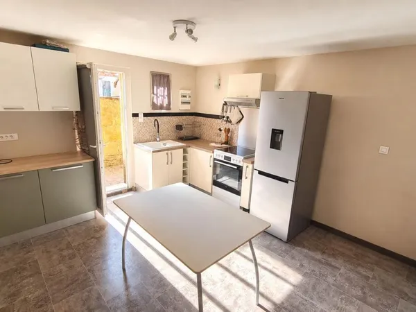 Maison à vendre avec jardin très proche centre ville