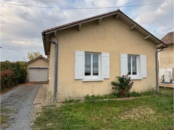 Maison de ville avec garage et jardin