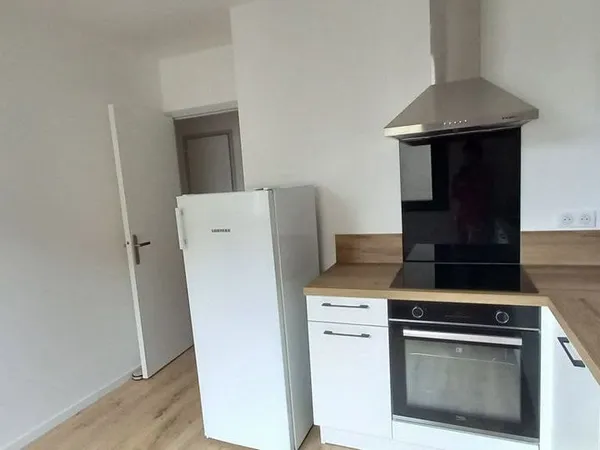 Appartement 52 m2 avec une Véranda de 6m2 un garage privatif et un cave