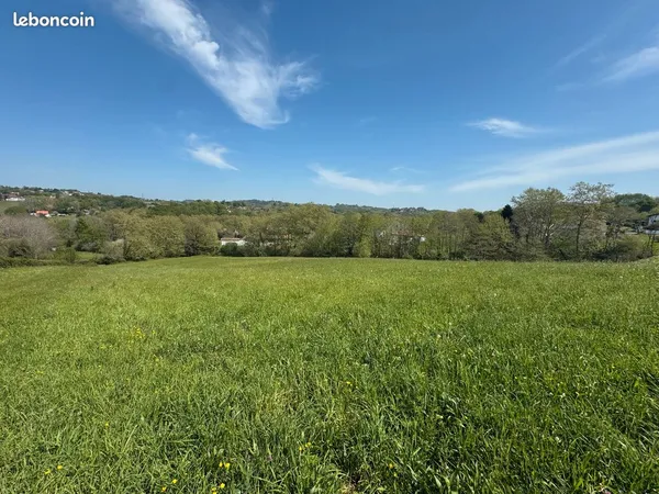 Exclu villefranque proche bourg terrain de 1036 m² vue campagne