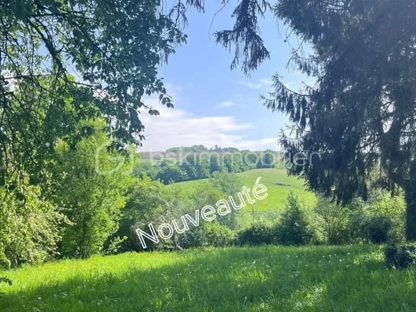 Terrain avec vue sur la campagne - Cadre verdoyant et préservé