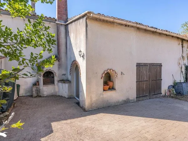 Maison de bourg de 6 pièces principales