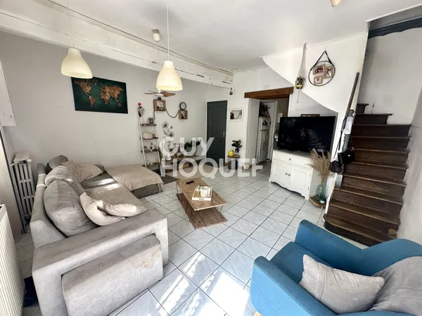 Immeuble comprenant deux maisons de 161.92 m²