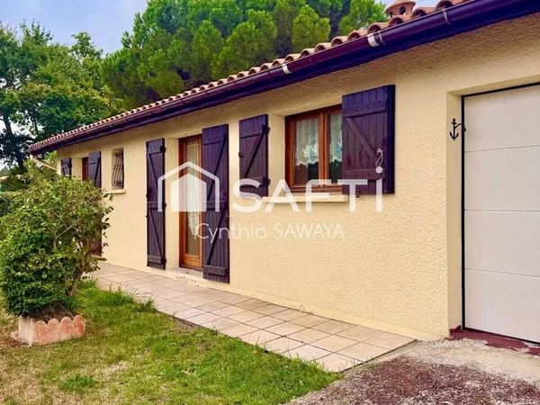 Belle maison à rafraîchir avec garage, terrasse couverte et cabanon
