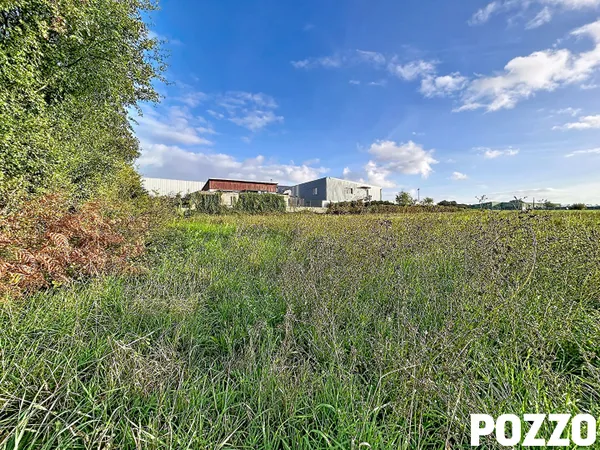 TOURNEVILLE SUR MER - terrain à bâtir viabilisé de 1210 m²