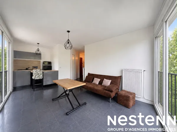 Appartement deux pièces à louer (ascenseur - parking - cave)
