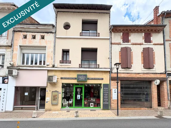 Immeuble mixte avec terrasse, garage et potentiel