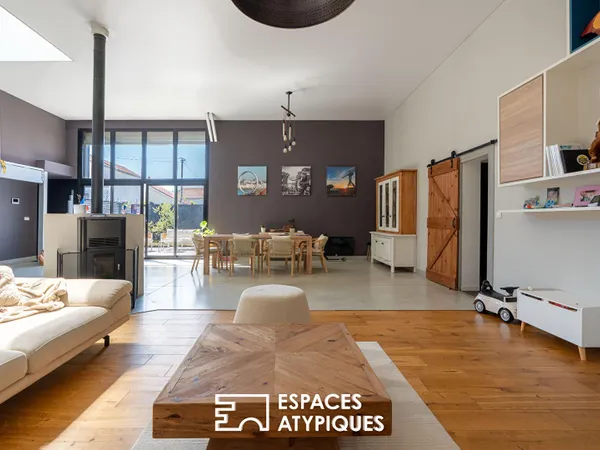 Loft design aux volumes généreux, proche de toutes les commodités