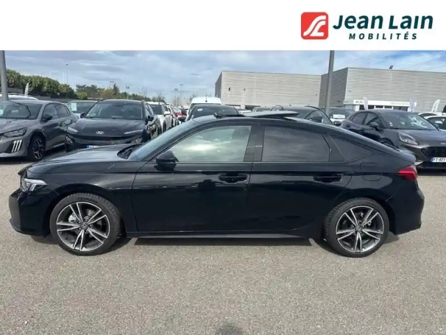 Honda Civic "e":hev 2.0 i-mmd — photo 26