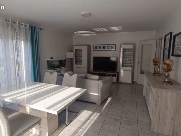 Maison T3 mitoyenne avec garage et jardin