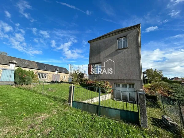 À 7 km d'Aunay-sur-Odon, maison à rénover avec jardin