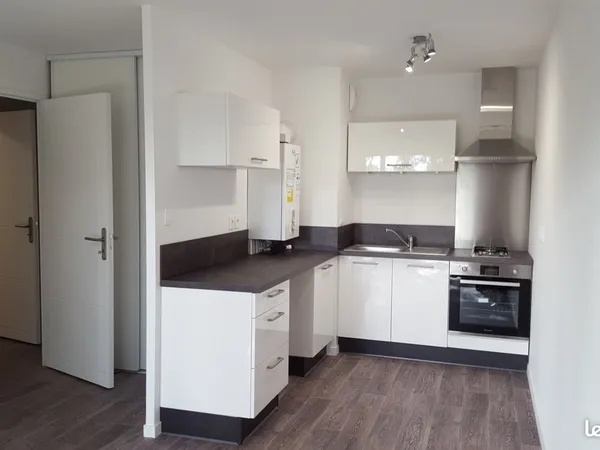 APPARTEMENT T2 RDC + TERRASSE 17 m2 + GARAGE + PARKING