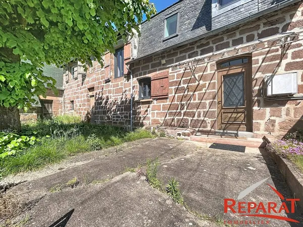 Maison mitoyenne 100 m² à Ussac - Jardin, cave et potentiel
