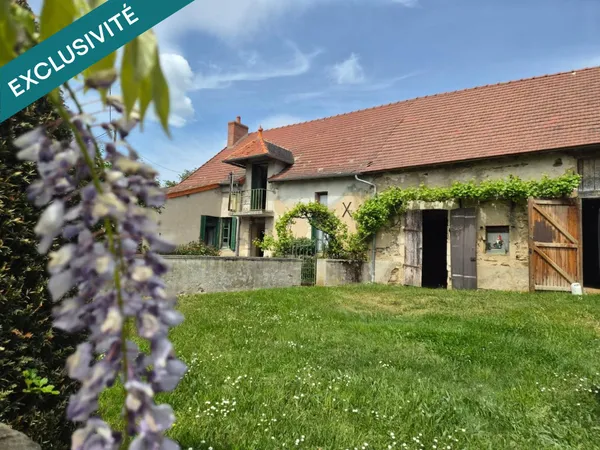 Maison de campagne avec terrain et granges