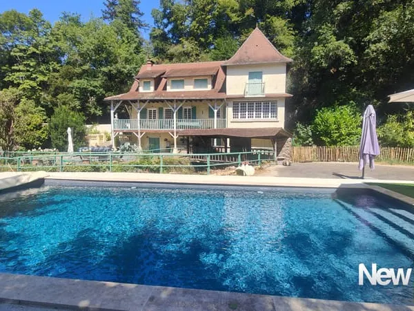 MOULIN DE CARACTÈRE EN CORRÈZE - 160 m² HABITABLES, 5,1 HECTARES BIO, DROIT D'EAU ET PISCINE