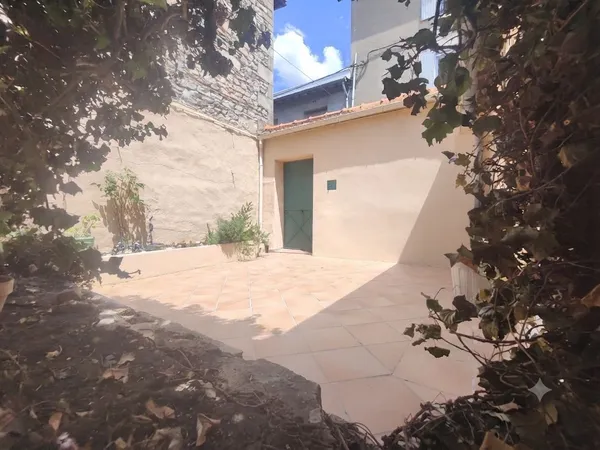 Maison de ville de plain pied avec cour interieure
