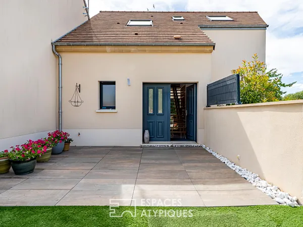 Maison contemporaine atypique de 180 m² sur trois niveaux avec rez-de-jardin