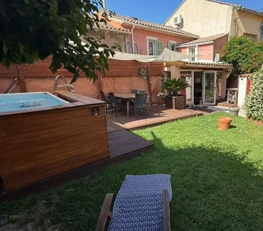 Vends maison avec jardin