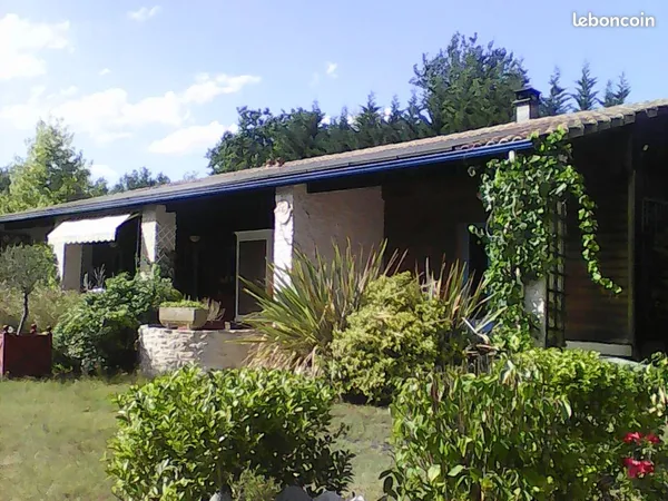 Maison pierre et ossature bois