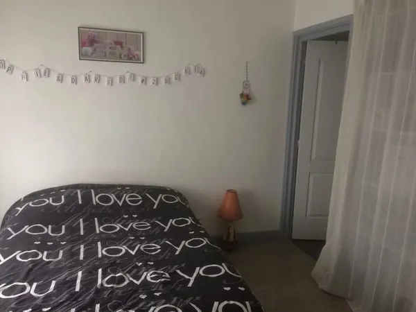 IMMEUBLE DE RAPPORT - 4 T3 + 8 GARAGES - 34 800 € DE LOYERS ANNUELS