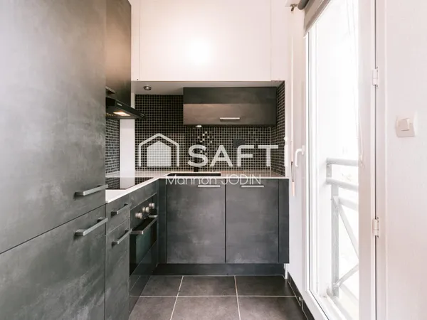 Appartement F2 avec balcon, cave et parking
