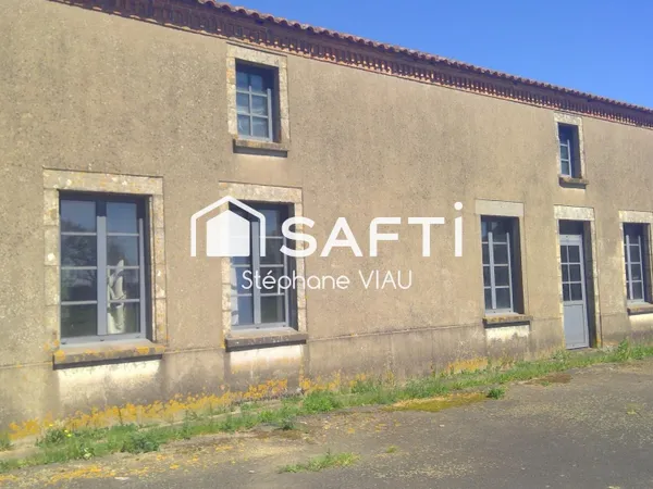 Bâtiments d'habitation avec une grange sur plus de 4000M2 de terrain