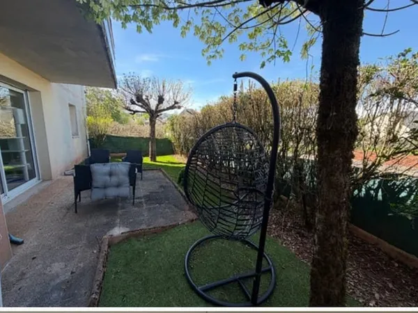 Appartement de type 2 avec jardin et place de parking