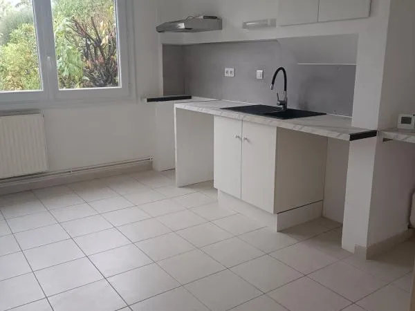Appartement T4 de 105m² en RDC avec jardin et garage