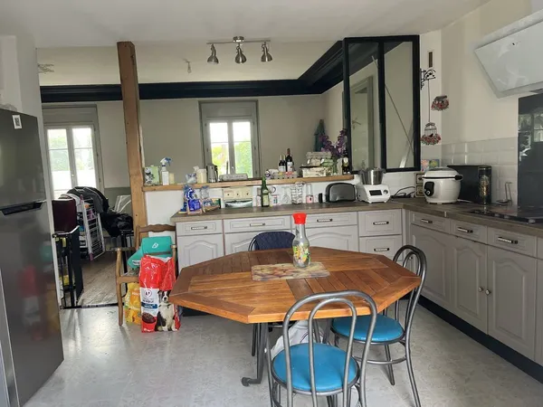 Un commerce deux logements une grange