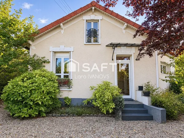 Maison avec jardin, terrasses et grand garage