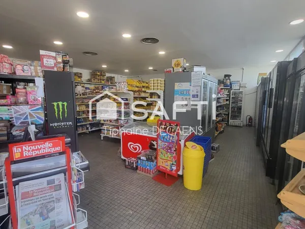 lot de 2 commerce accollé avec parking privé