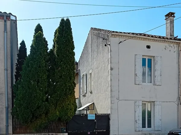 Maison de ville avec parking et jardin habitable foncier 940 euros