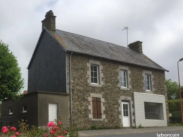 Maison bourg avec jardin , 2 garages 4 chambres et extensions aménageable