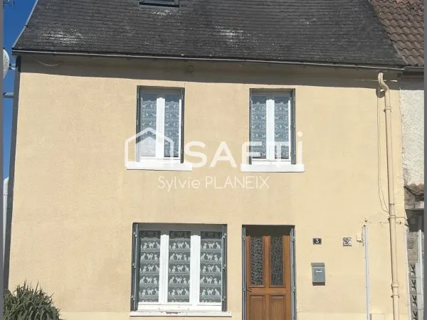 Charmante maison mitoyenne