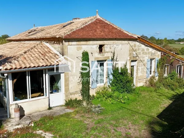 Belle propriété en pierre rénovée avec 5,5 hectares, dépendances et studio indépendant